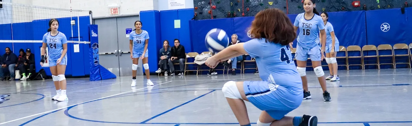 girl hitting volleyball
