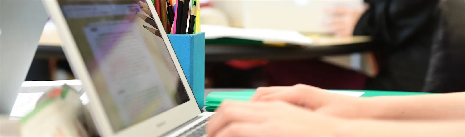 person typing on computer